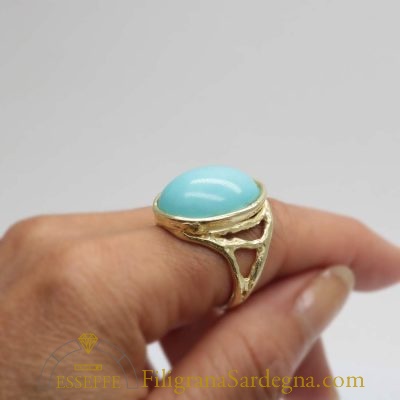 Anello argento dorato con grande turchese