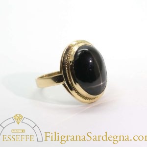 Anello in oro con diopside stellato