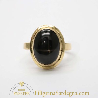 Anello in oro con diopside stellato