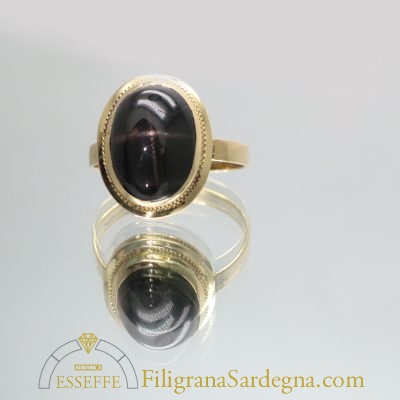 Anello in oro con diopside stellato